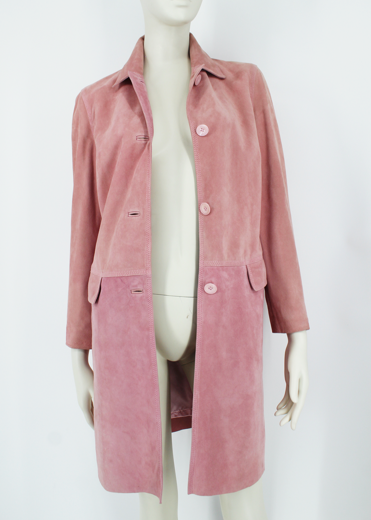 A buttery soft pink suede long jacket by Feraud. Features tones of blush and peach pink in an ultra-elegant, timeless silhouette.