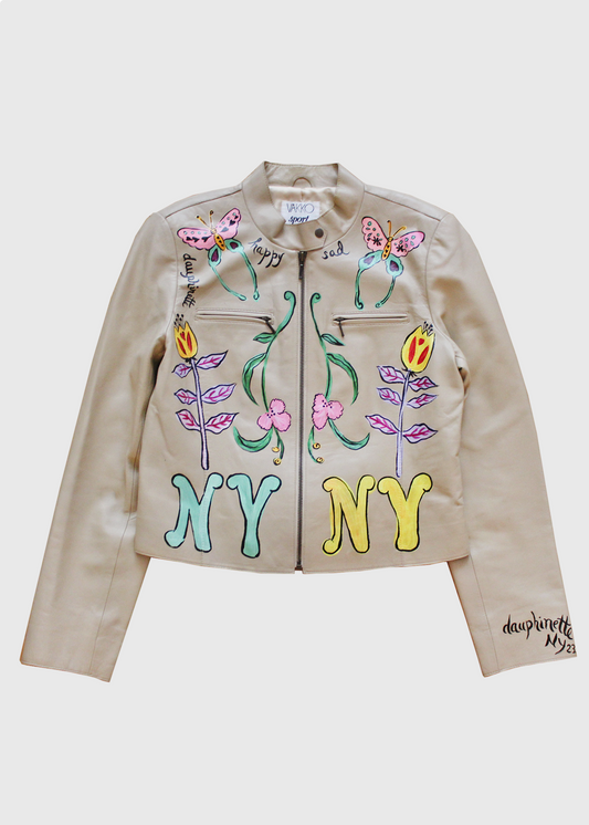 Hand-painted 1980s leather jacket featuring an elaborate amalgamation of colorful butterflies, alien flowers, the words "happy" and "sad", and one mint green and one yellow "NY" painted on either side of the jackets center front zipper.