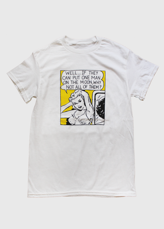A white cotton t-shirt with a black, white, and yellow square image of a woman saying "Well... if they can put one man on the moon, why not all of them?" centers on the chest of the shirt.